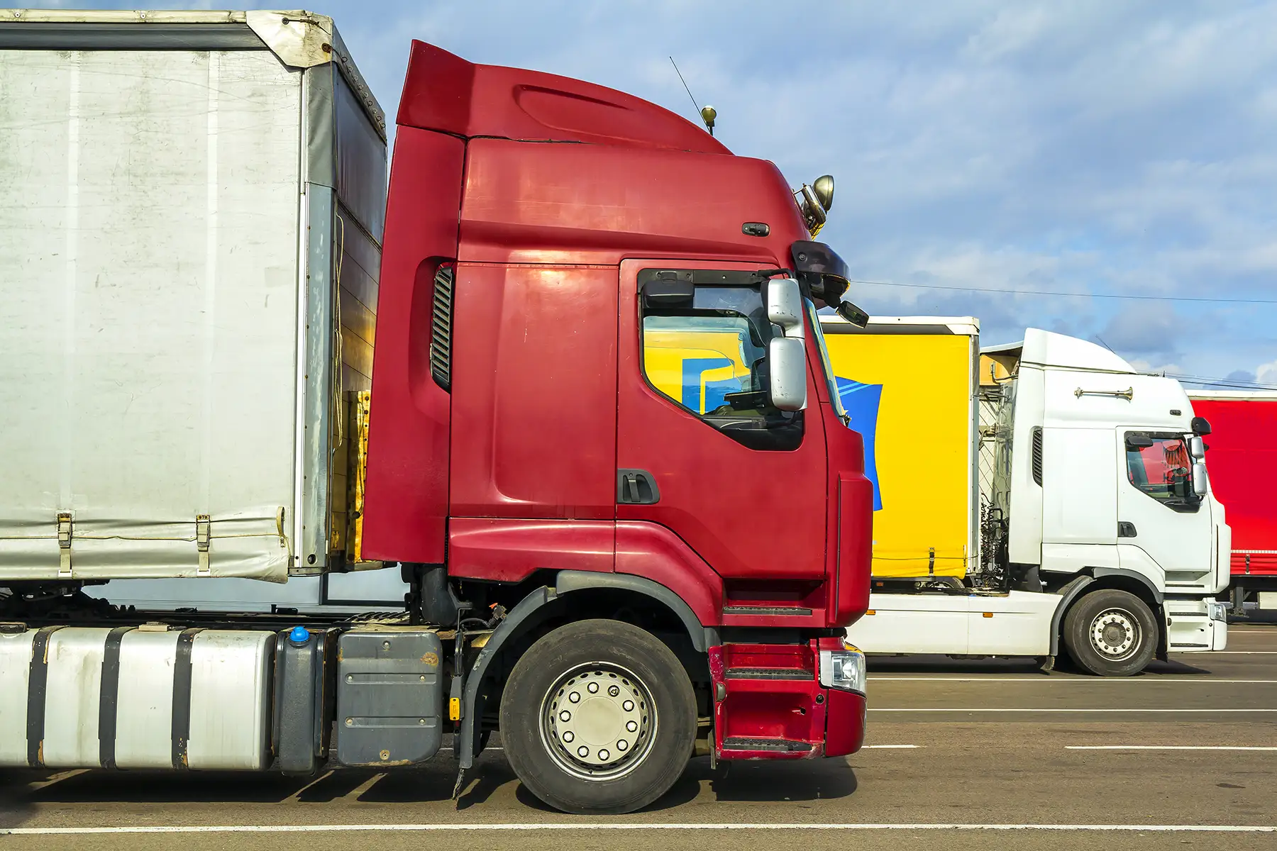 Logistics trucks traveling on a highway